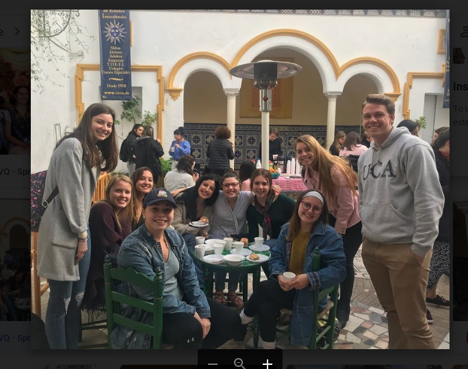 American Students Having Coffee Together In Seville