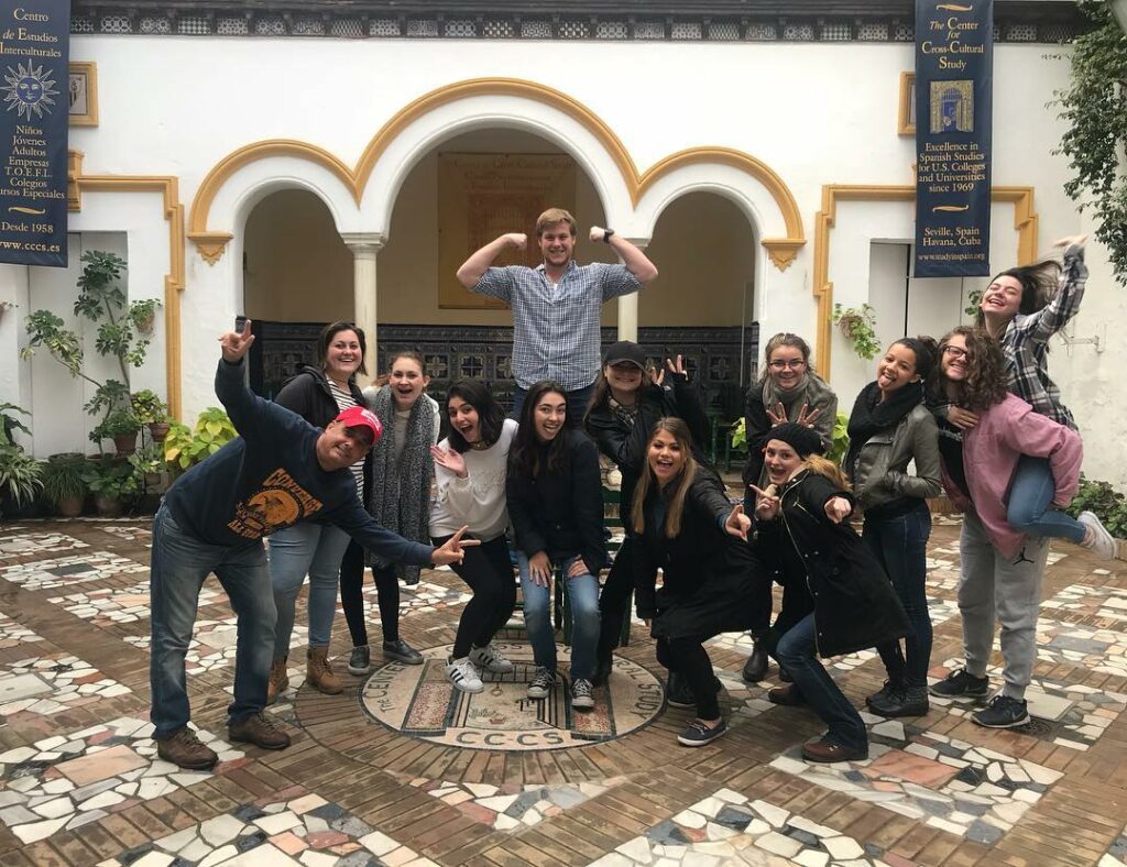 Study abroad students posing at the SSA Center in Seville.